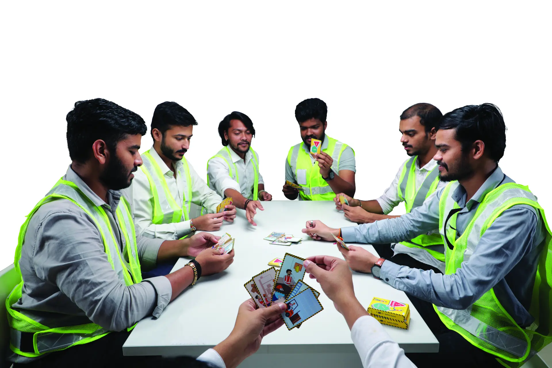 Workers playing a safety card game during a toolbox talk