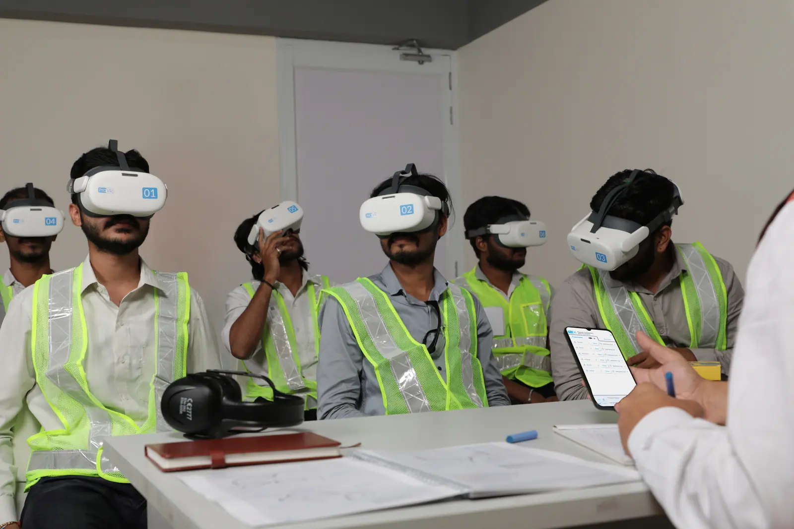 Trainees experiencing a ProVR VR session with headsets
